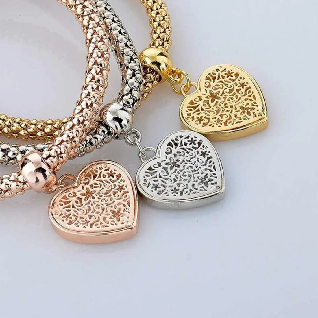 Yellow Chimes Combo of 3 Pcs Stylish Exclusive Heart Shape Rodium Platinum Plated Stretchable Charm Bracelet for Women